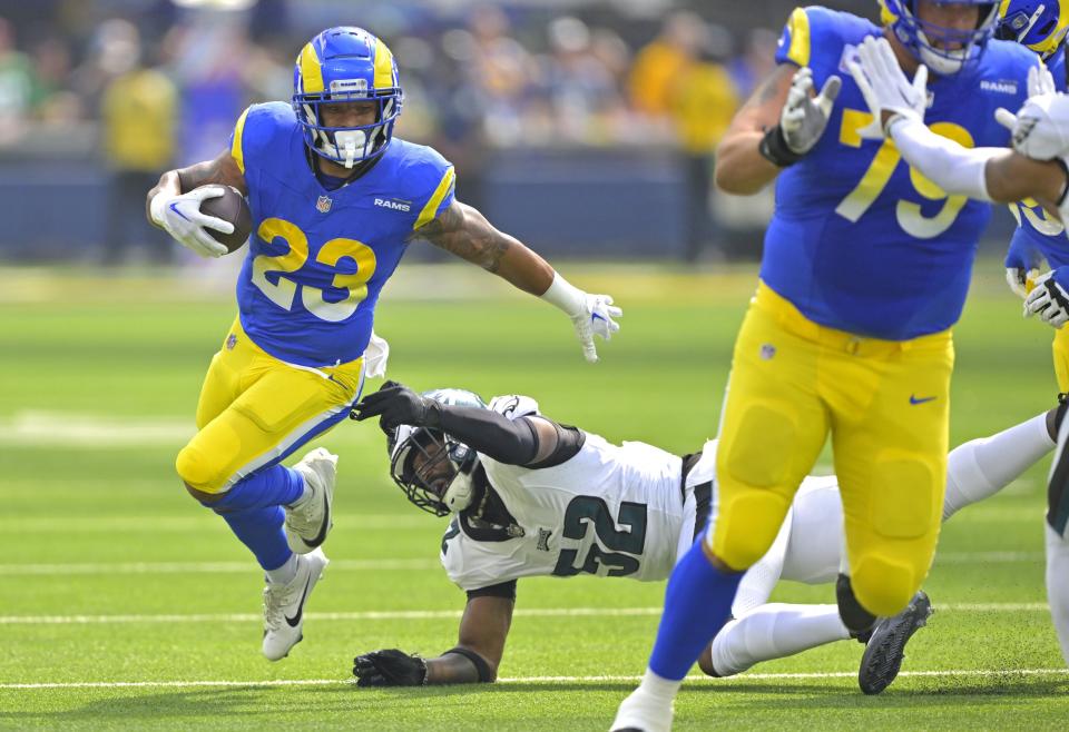 Oct 8, 2023; Inglewood, California, USA; Los Angeles Rams running back Kyren Williams (23) carries the ball past <a class="link " href="https://sports.yahoo.com/nfl/teams/philadelphia/" data-i13n="sec:content-canvas;subsec:anchor_text;elm:context_link" data-ylk="slk:Philadelphia Eagles;sec:content-canvas;subsec:anchor_text;elm:context_link;itc:0">Philadelphia Eagles</a> linebacker <a class="link " href="https://sports.yahoo.com/nfl/players/30170" data-i13n="sec:content-canvas;subsec:anchor_text;elm:context_link" data-ylk="slk:Zach Cunningham;sec:content-canvas;subsec:anchor_text;elm:context_link;itc:0">Zach Cunningham</a> (52) in the first half at SoFi Stadium. Mandatory Credit: Jayne Kamin-Oncea-USA TODAY Sports