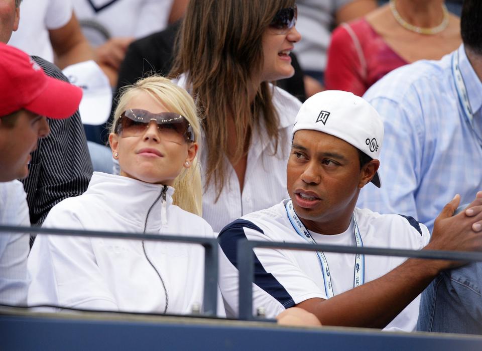 &nbsp;Tiger Woods and his wife, Elin Woods, attend the men's final between Roger Federe of Switzerland and Andy Roddick at the U.S. Open at the USTA Billie Jean King National Tennis Center in Flushing Meadows Corona Park on September 10, 2006 in the Flushing neighborhood of the Queens borough of New York City. (Photo by Matthew Stockman/Getty Images)