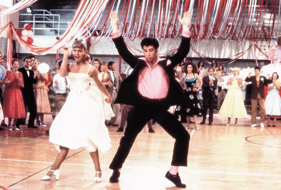 Olivia Newton-John, left, and John Travolta in “Grease.” (Paramount Pictures/Album/Zuma Press/TNS)