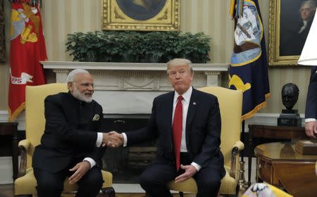 U.S. President Donald Trump (R) meets with Indian Prime Minister Narendra Modi in the Oval Office at the White House in Washington, U.S., June 26, 2017. REUTERS/Carlos Barria