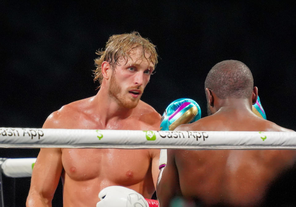 MIAMI, FL - JUNE 6: Floyd Mayweather and Logan Paul take to the ring for 8 rounds of the Mayweather vs Paul: Bragging Rights boxing event on June 06, 2021, at Hard Rock Stadium in Miami, Florida. (Photo by Louis Grasse/PxImages/Icon Sportswire via Getty Images)