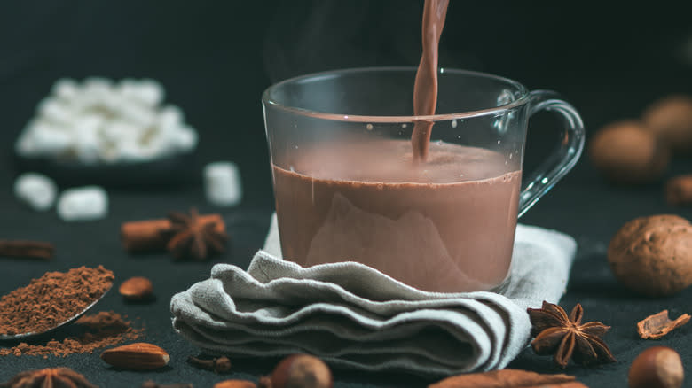 Pouring hot chocolate into mug