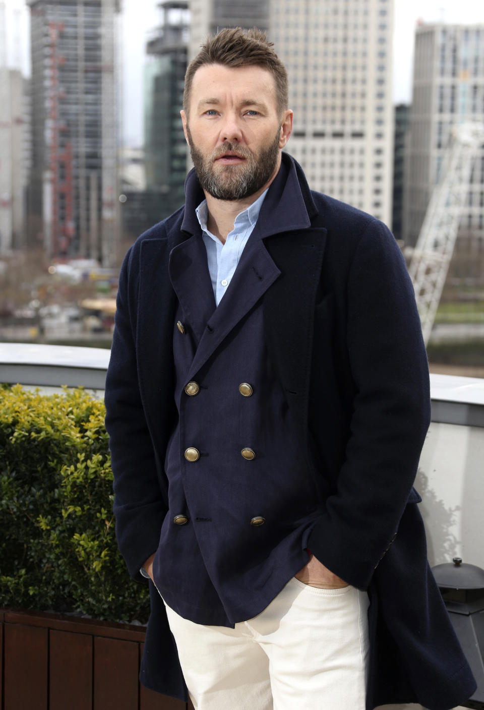 FILE - In this Feb. 20, 2018 file photo, actor Joel Edgerton poses for photographers at the photo call for the film 'Red Sparrow' in London. Edgerton is 46 on June 23. (Photo by Joel C Ryan/Invision/AP, File)