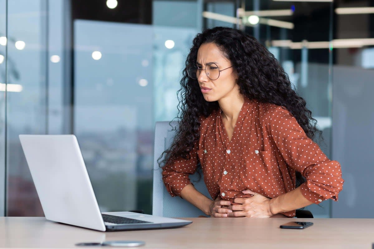 IBS could cause pain and anxiety at work (Alamy/PA)