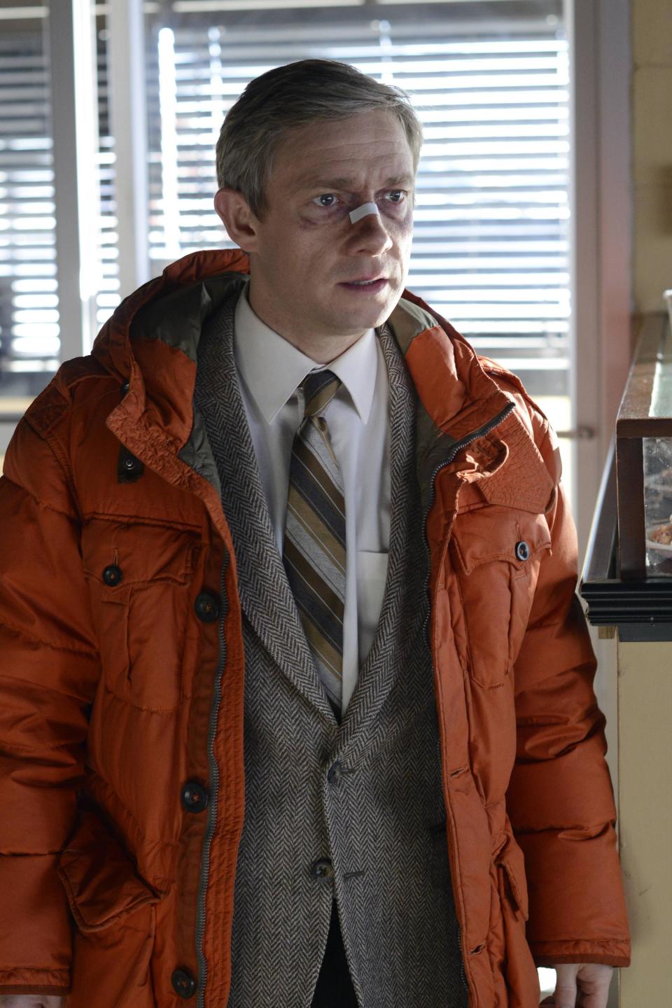 This image released by FX shows Martin Freeman as Lester Nygaard in a scene from "Fargo." The 10-episode season premieres Tuesday at 10 p.m. EDT on FX. (AP Photo/FX, Chris Large)