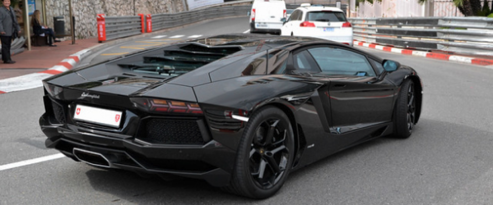 Black Lamborghini on the road