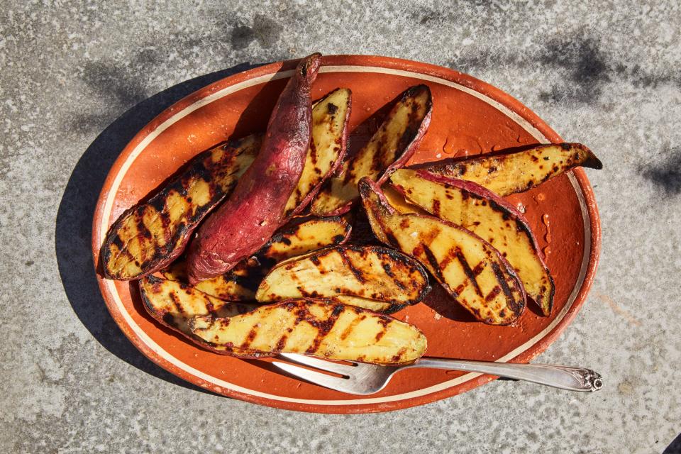 Sweet potato fries? Sure, they’re alright. But halved Japanese sweet potatoes, charred and glossed with honey and vinegar? That’s a side dish to remember. <a href="https://www.epicurious.com/recipes/food/views/charred-sweet-potatoes-with-honey-and-olive-oil?mbid=synd_yahoo_rss" rel="nofollow noopener" target="_blank" data-ylk="slk:See recipe.;elm:context_link;itc:0" class="link ">See recipe.</a>