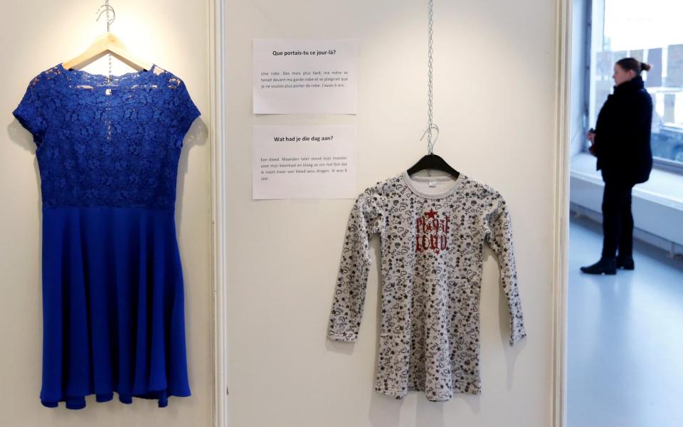 The What Were You Wearing? exhibition showcases the stories of rape victims through the clothes they were wearing when they were assaulted - REUTERS