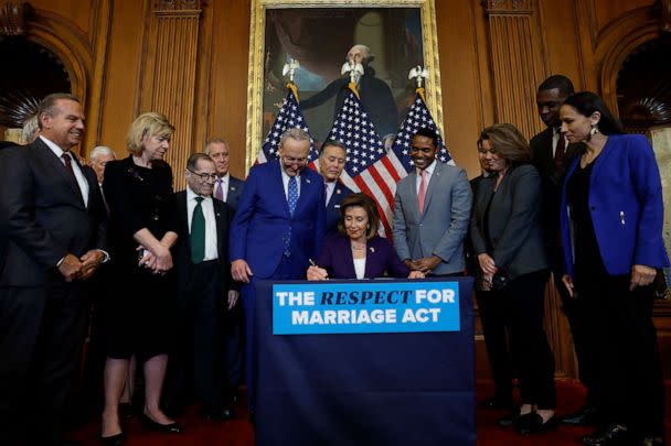 PHOTO: House Speaker Nancy Pelosi participates in a bill enrollment ceremony alongside Senate Majority Leader Chuck Schumer and a bipartisan group of Senators and Representatives at the U.S. Capitol Building on Dec. 8, 2022, in Washington, D.C. (Anna Moneymaker/Getty Images)