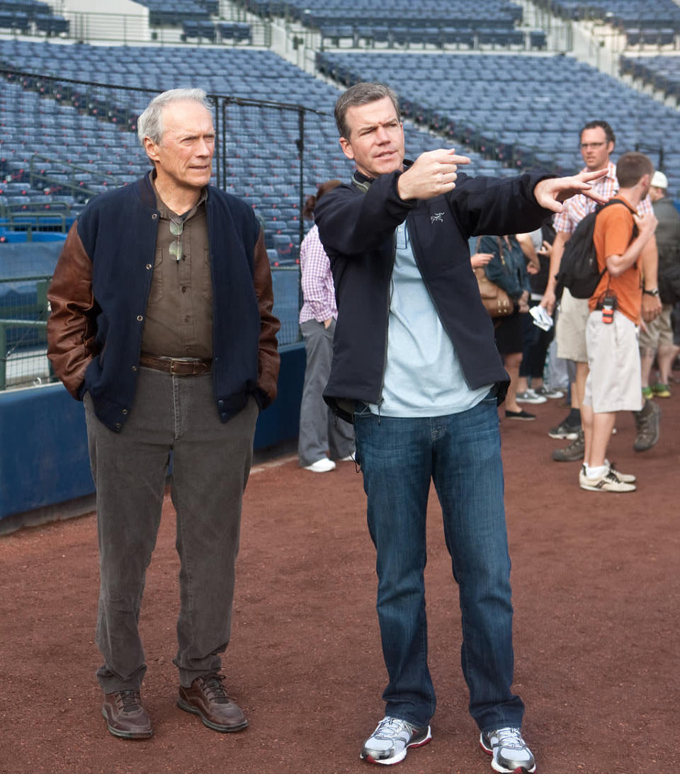 Clint Eastwood and Robert Lorenz on the set of Warner Bros. Pictures' "Trouble with the Curve" - 2012