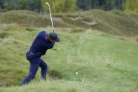 Team USA's Justin Thomas hits on the fifth hole during a practice day at the Ryder Cup at the Whistling Straits Golf Course Tuesday, Sept. 21, 2021, in Sheboygan, Wis. (AP Photo/Charlie Neibergall)