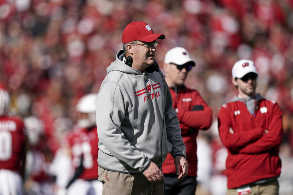 Wisconsin head coach Paul Chryst looks on as a injured player is loaded in to an ambulance during the second half of an NCAA college football game against Iowa Saturday, Oct. 30, 2021, in Madison, Wis. Wisconsin upset Iowa 27-7. (AP Photo/Andy Manis)