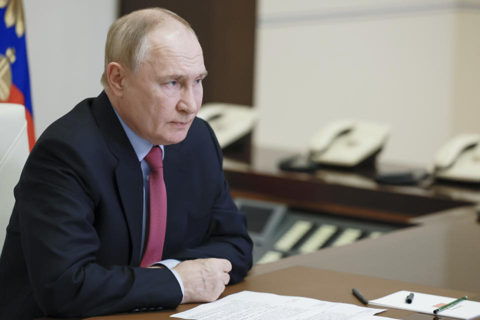 Russian President Vladimir Putin attends a cabinet meeting via videoconference at the Novo-Ogaryovo residence outside Moscow, Russia, Wednesday, July 10, 2024. (Vyacheslav Prokofyev, Sputnik, Kremlin Pool Photo via AP)