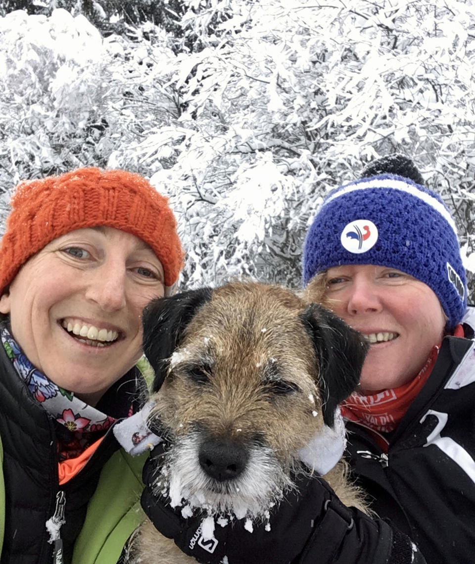 Pete the border terrier with his owners, Jo Partington and Natasha Cooper in the French Alps. (Photo: Caters News)