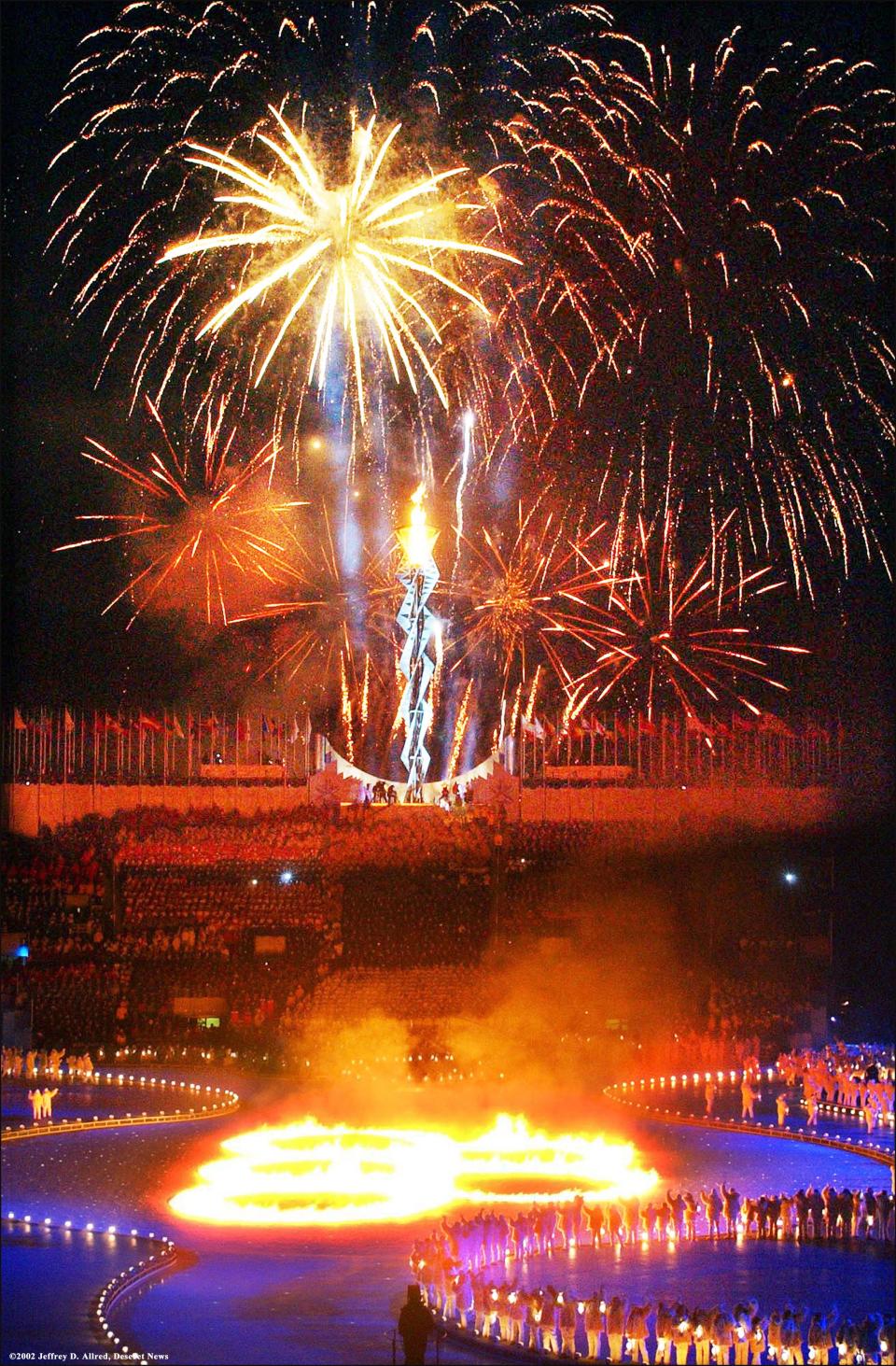 Fireworks fill the sky after the cauldron is lit during the Salt Lake 2002 Winter Games at the University of Utah’s Rice-Eccles Stadium, Feb. 8, 2002. | Jeffrey D. Allred, Deseret News