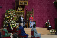 Queen Maxima listens as Dutch King Willem-Alexander marks the opening of the parliamentary year with a speech outlining the government's budget plans for the year ahead at the Grote Kerk, or Sint-Jacobus Kerk, (Great Church or St. James' Church) in The Hague, Netherlands, Tuesday, Sept. 21, 2021. (AP Photo/Peter Dejong)
