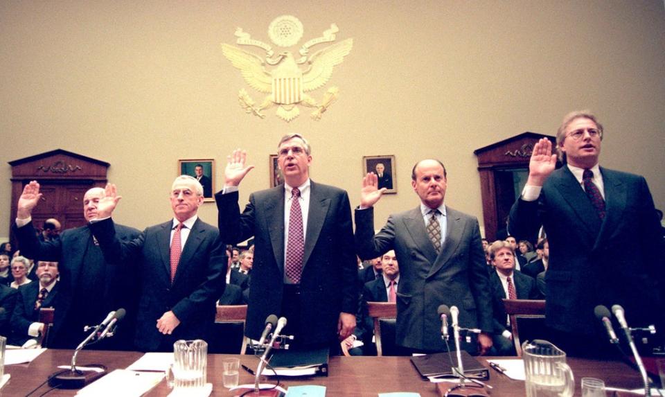 The heads of Big Tobacco being sworn in before testifying before the US House Commerce Committee on Capitol Hill in 1994 (AFP via Getty Images)