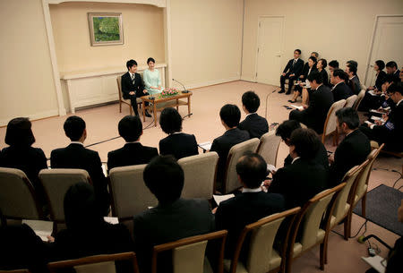 Princess Mako, the elder daughter of Prince Akishino and Princess Kiko, speaks to media with her fiancee Kei Komuro, a university friend of Princess Mako, during a press conference to announce their engagement at Akasaka East Residence in Tokyo, Japan, September 3, 2017. REUTERS/Shizuo Kambayashi/Pool