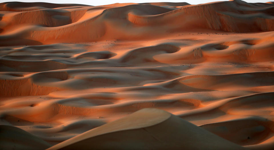 <p>The beautiful Liwa desert, about 250 kilometers west of Abu Dhabi, is the setting for the annual Moreeb Dune Festival. (Photo: Karim Sahib/AFP/Getty Images) </p>