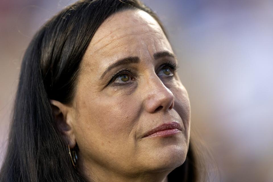 Becky Long, representing veteran George Ciampa, sheds tears during a military recognition at the Stadium of Fire in Provo on Saturday, July 1, 2023. | Scott G Winterton, Deseret News