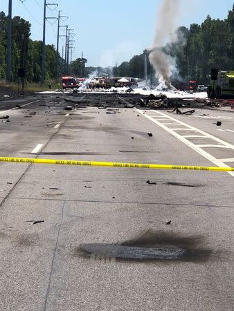 The military plane crash site is seen in Savannah, Georgia, U.S., May 2, 2018 in this picture obtained from social media. TWITTER/@IAFF574/via REUTERS