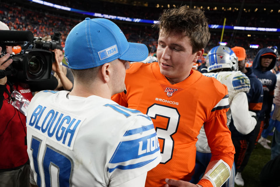 Denver Broncos quarterback Drew Lock (3) greets Detroit Lions quarterback David Blough (10) at mid field an NFL football game, Sunday, Dec. 22, 2019, in Denver. The Broncos won 27-17. (AP Photo/Jack Dempsey)