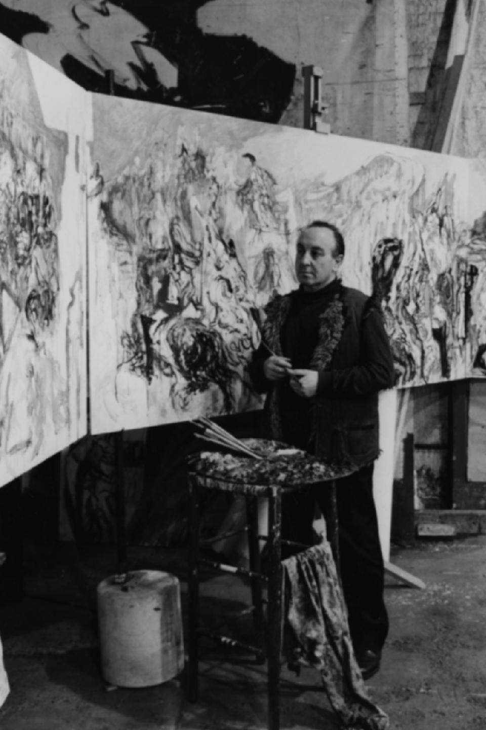 Polish painter Feliks Topolski RA working on a large mural depicting scenes from the Queen's Coronation, which has been commissioned by Prince Philip,