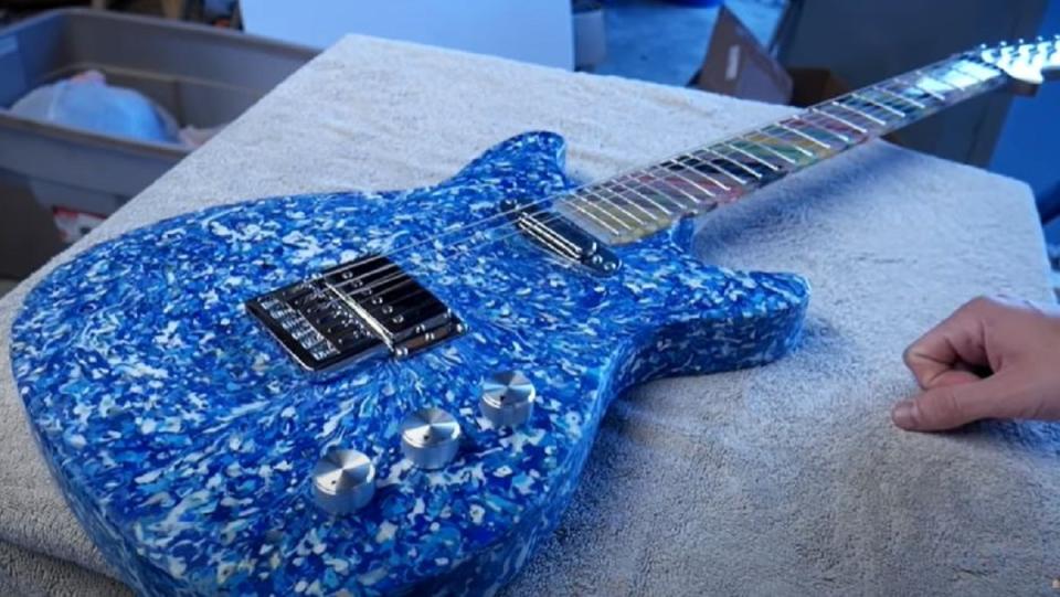 Artist Burls created this guitar made out of plastic junk found in the ocean.