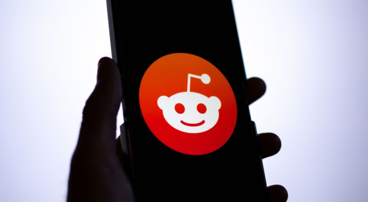 Reddit (RDDT) app logo on a smartphone screen.