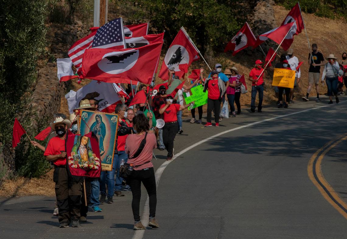 Protestors march toward PlumpJack Winery, owned by Gov. Gavin Newsom, in response to the governor’s veto of AB 616 on Sept. 25, 2021 in Yountville, CA. Photo by Rahul Lal for CalMatters