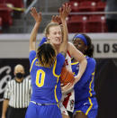 North Carolina State's Elissa Cunane (33) pulls in the rebound from Pittsburgh's Sandrine Clesca (0) and Rita Igbokwe (23) during the first half of an NCAA college basketball game, Thursday, Feb. 25, 2021 in Raleigh, N.C. (Ethan Hyman/The News & Observer via AP, Pool)