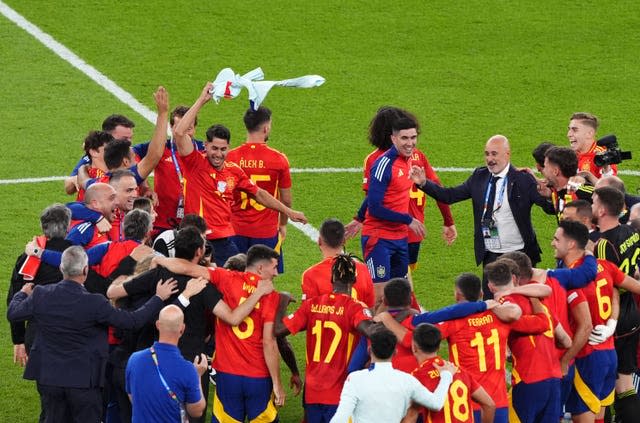 Spain players celebrate 