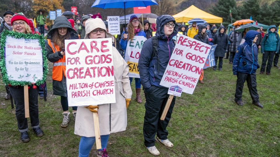 Climate protesters participate in a climate march in Scotland