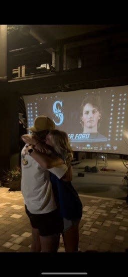 Pace alumnus Walter Ford embraces family and friends after being selected by the Seattle Mariners with the 74th overall pick in the 2022 MLB Draft.
