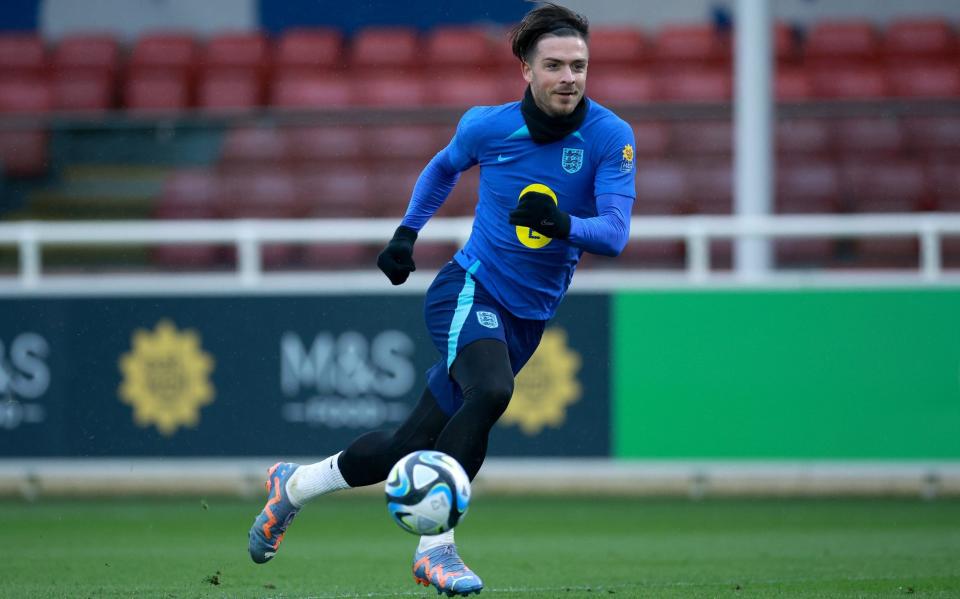 Jack Grealish of England runs during a training session at St George's Park - How 16 scoops of ice cream helped Jack Grealish get over World Cup heartbreak - Getty Images/Eddie Keogh