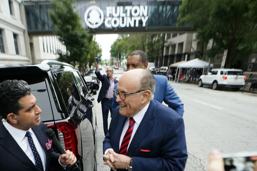 Rudy Giuliani arrives at the Fulton County Courthouse on Wednesday, Aug. 17, 2022, in Atlanta. Giuliani is scheduled to testify before a special grand jury that is investigating attempts by former President Donald Trump and others to overturn his 2020 election defeat in Georgia. (AP Photo/John Bazemore)