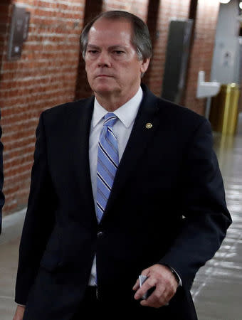 James Wolfe, a longtime staffer of the Senate Intelligence Committee, arrives on Capitol Hill in Washington, U.S., October 25, 2017. REUTERS/Aaron P. Bernstein/Files