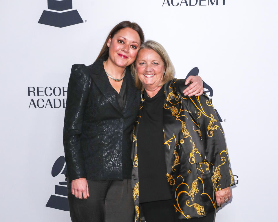 FILE - Tuesday, Jan. 7, 2020, file photo, Hillary Lindsey, left, and Liz Rose arrive at the 62nd Annual GRAMMY Awards - Nashville Nominee Party at the Hutton Hotel, in Nashville, Tenn. Nashville songwriters are showing up at the Grammys this year, but not just in the country music categories. A trio of hit country songwriters, Lindsey, Lori McKenna and Natalie Hemby, are nominated for writing songs for the "A Star is Born" soundtrack with Lady Gaga. (Photo by Al Wagner/Invision/AP, File)