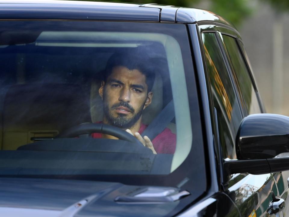 Luis Suarez arrives for one of his final training sessions (AFP via Getty Images)