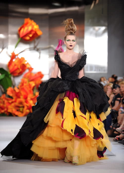Galliano is known for extravagance. The Fall 2010 Dior show had a wild flower motif.