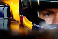 MONTREAL, CANADA - JUNE 08: Sebastian Vettel of Germany and Red Bull Racing sits in his car in the garage during practice for the Canadian Formula One Grand Prix at the Circuit Gilles Villeneuve on June 8, 2012 in Montreal, Canada. (Photo by Vladimir Rys/Getty Images)