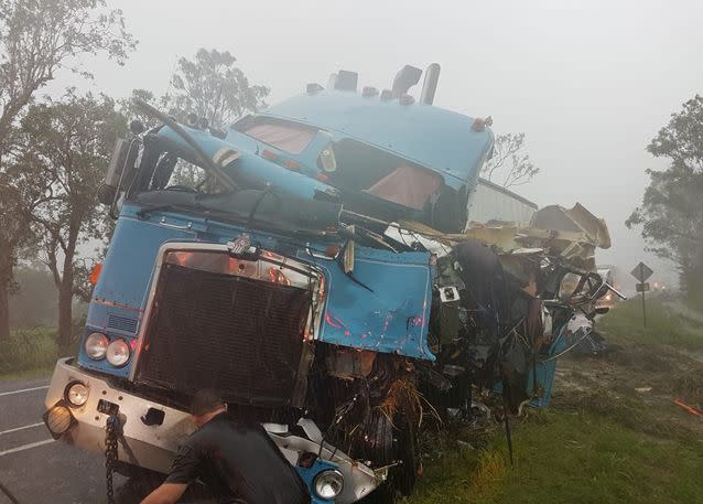 B-double driver escapes injury while his truck got crushed. Picture: 7 News