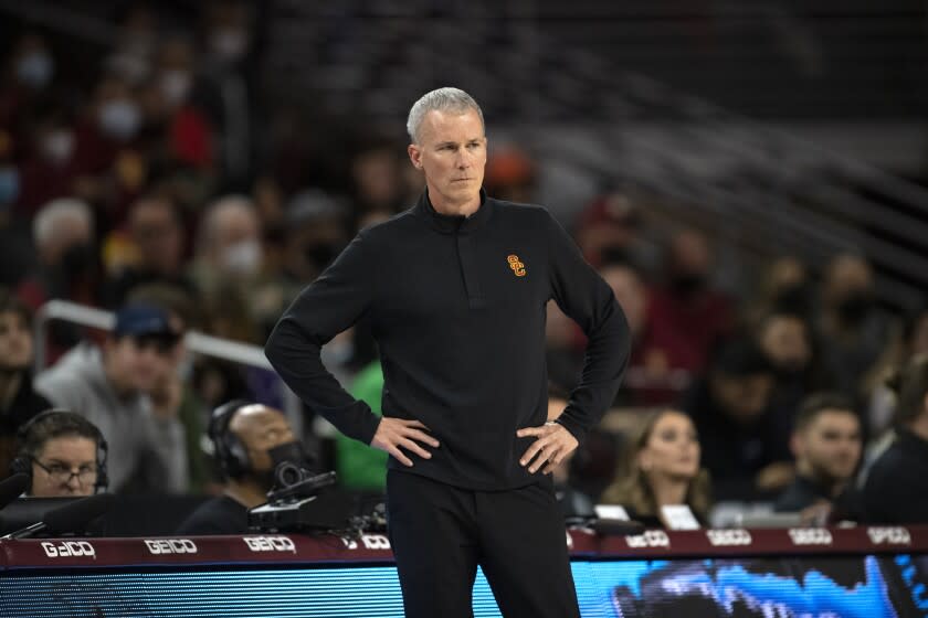 Southern California head coach Andy Enfield watches his players during an NCAA college basketball game against the UC Irvine Wednesday, Dec. 15, 2021, in Los Angeles. (AP Photo/Kyusung Gong)