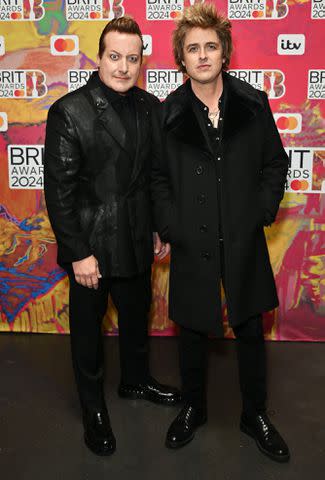 <p>Jed Cullen/Dave Benett/Getty </p> Tré Cool and Billie Joe Armstrong of Green Day