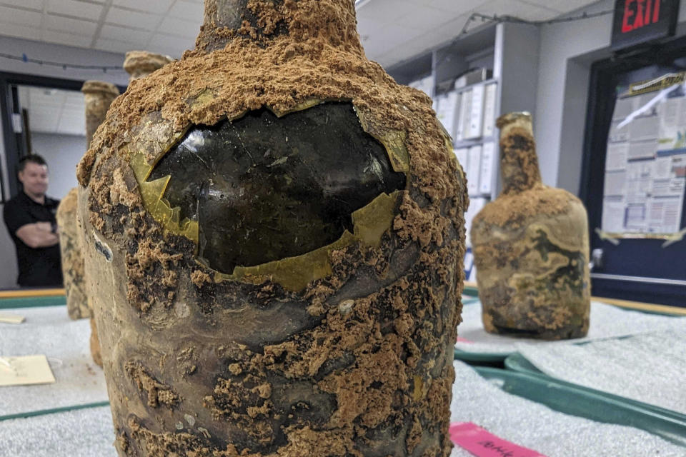 18th century artifacts found underneath George Washington's residence in Mount Vernon, Va., Monday, June 17, 2024. Earlier this year, a few dozen 18th-century glass bottles containing fruit were unearthed in the mansion cellar of the America's first president. (AP Photo/Nathan Ellgren)