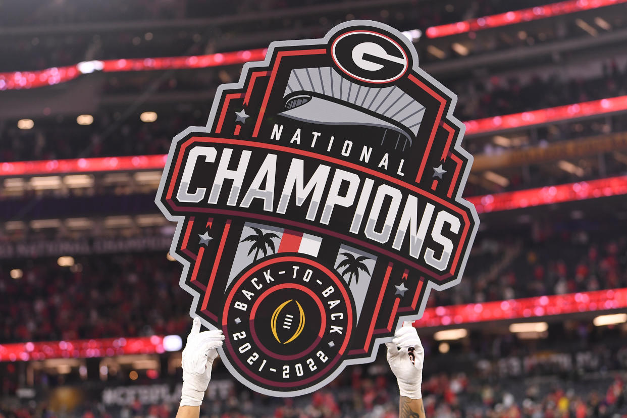 INGLEWOOD, CA - JANUARY 09: A player holds up a sign after Georgia Bulldogs wins their game versus the TCU Horned Frogs in the College Football Playoff National Championship game on January 9, 2023, at SoFi Stadium in Inglewood, CA. (Photo by Brian Rothmuller/Icon Sportswire via Getty Images)