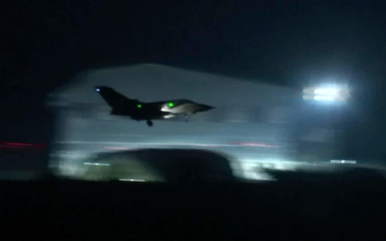 Fighter jets were seen taking off from a British Royal Air Force (RAF) base in Cyprus early on Saturday  - AP Video