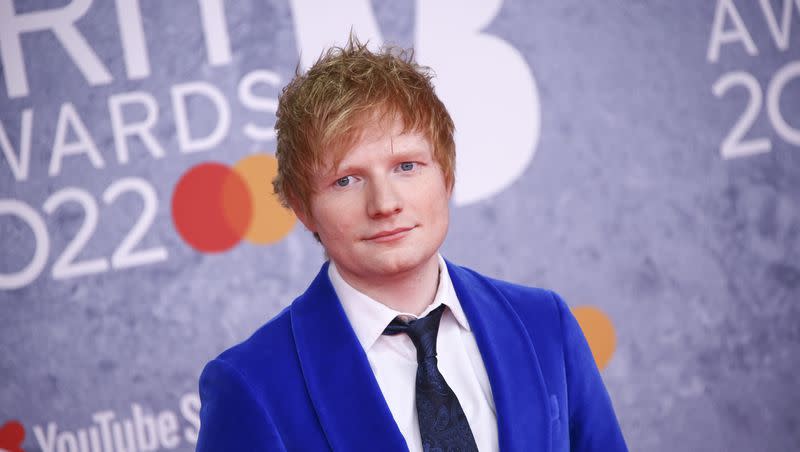 Ed Sheeran poses for photographers upon arrival at the Brit Awards 2022 in London. A copyright infringement trial regarding Sheeran’s song “Thinking Out Loud” and Marvin Gaye’s “Let’s Get It On” is coming to a close.