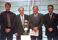 FILE - Soccer coaches from left, Guus Hiddink from Netherlands, Craig Brown of Scotland, Terry Venables of England, and Hans-Peter Zaugg of Switzerland with the EURO96 soccer trophy, Sunday Dec. 17, 1995. Former England, Tottenham and Barcelona manager Terry Venables has died, it was announced Sunday, Nov. 26, 2023. He was 80. (AP Photo/Dave Caulkin, file)