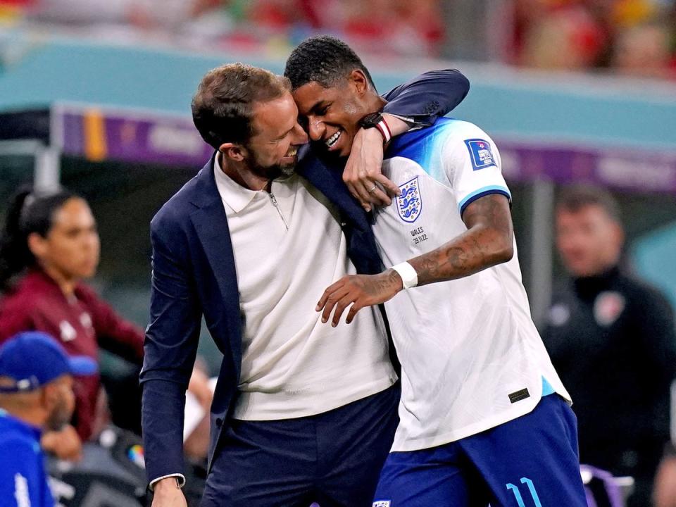 Gareth Southgate hugs Marcus Rashford as he is substituted (PA)